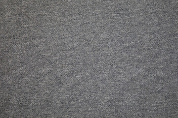 Floor covering. Grey fabric background with fibers.