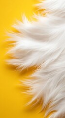 Obraz premium White fur texture detail, set against a vibrant golden yellow background