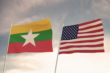 Relations between the countries of the United States of America USA and MYANMAR represented by the concept of two flags waving against a cloudy sky.3d render.