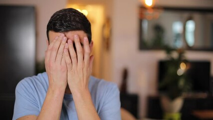Adult man playing "peek a boo" 