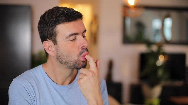 Comedic video of grown up man picking his nose