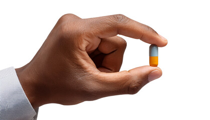 Fototapeta premium Hand holding a white pill against a white background