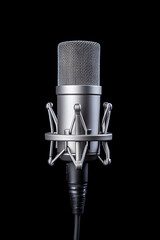 Studio condenser microphone on black background