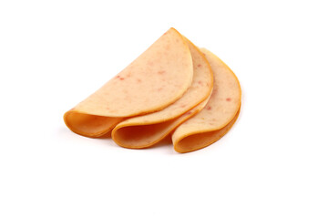sliced cold smoked turkey breast isolated on white background. top view