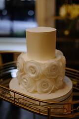 Elegant white cake adorned with beautiful floral decoration for special occasions