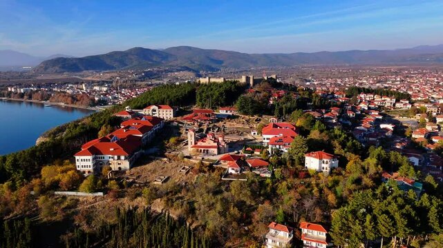 Drone shot of Old city park in Ohrid, showcasing the university and the Church of Saints Clement of Ohrid and Samuel's Fortress