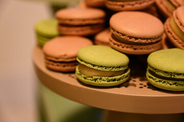 macaroons on a wooden background, macaroons on a wooden table, sweet shop
