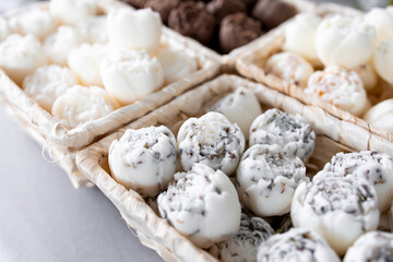 Assorted solid aroma oil in the form of peonies in woven baskets