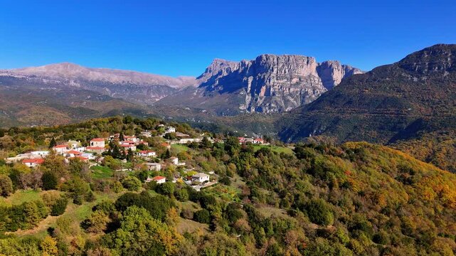 Orbital drone shot of Agios Minas in village Vikos-Ao&ouml;s National Park in Autumn