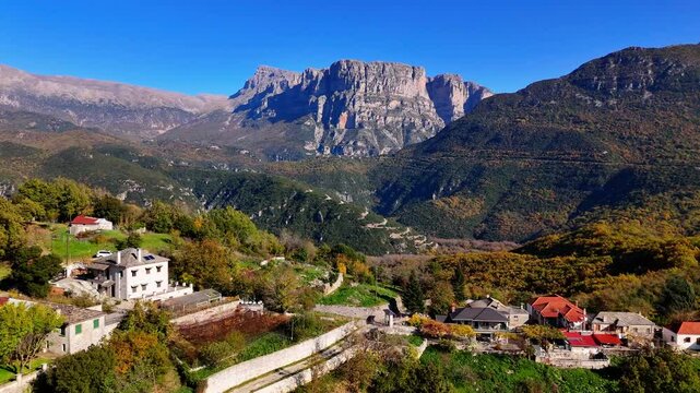 Epic drone shot of impressive mountain village in Vikos-Ao&ouml;s National Park