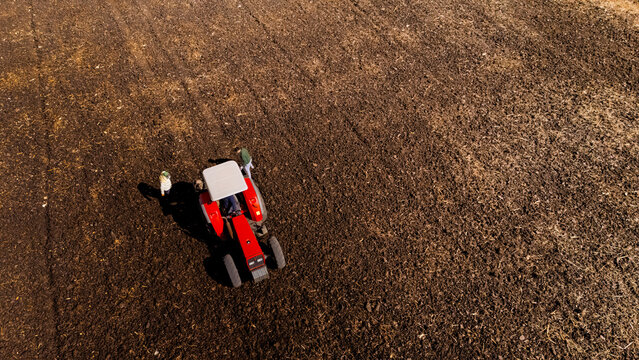 Aerial view of a tractor cleaning a field in Michoacan, Mexico