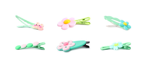 Different cute hair clips isolated on white, set