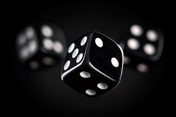 Black dice falling against a dark background, sharp focus on the central die.  Three dice in motion, creating a dynamic composition.