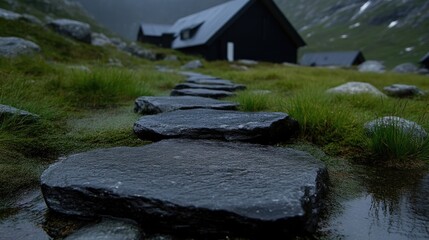 Mountain path, wet stones, hut background