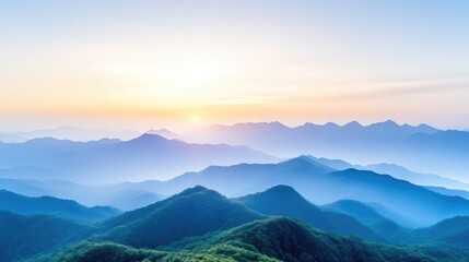 Fototapeta premium Majestic mountain range at sunrise. Misty, tranquil peaks, soft light