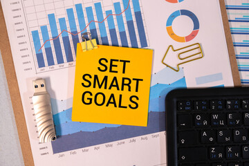 set smart goals inspirational reminder - macro shot of sticky note from a low