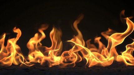 Fototapeta premium An intense photo of dynamic fire flames on a dark background.