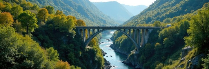 Bridge spanning a valley with a meandering river and forest, forest, trees, foliage
