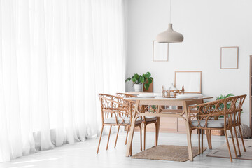 Interior of stylish dining room with served table