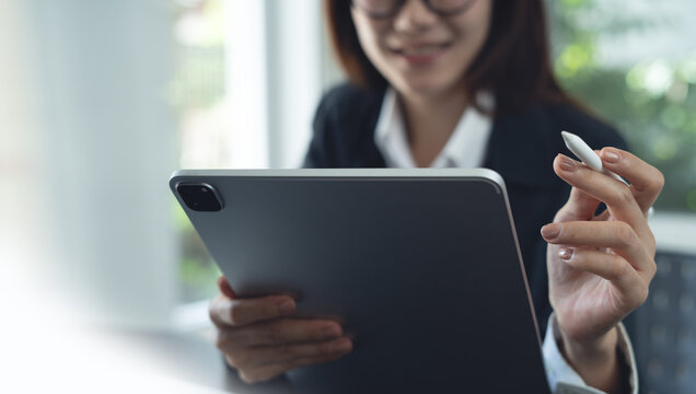Video call, online meeting with colleagues meeting remote event, businesswoman at office using computer and digital tablet at work joining web conferencee via online meeting app, viedeo conference - Powered by Adobe