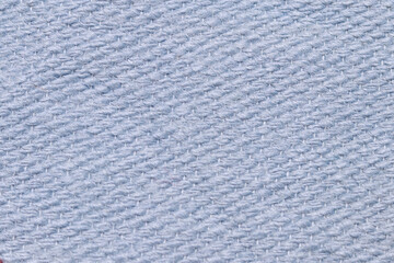 Pale blue cotton fabric wall material. Surface of cotton canvas fabric texture abstract background. High resolution photo.