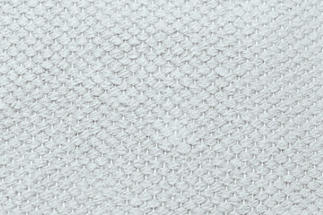 White cotton fabric canvas cloth background. Surface of fabric texture in white winter color.

