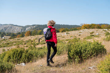 A male hiker trail hiking mountain forest, active lifestyle.