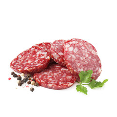 Pieces of delicious dry cured sausage and spices isolated on white
