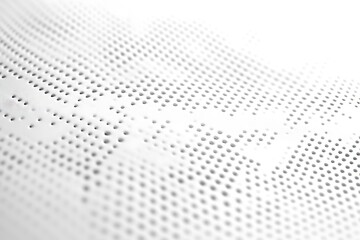 Abstract perforated white surface texture background with repeating hole pattern design
