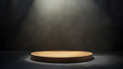 Round wooden platform illuminated by spotlights with dark background creating a dramatic and artistic stage setup
