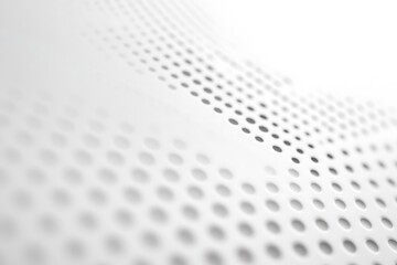 White perforated metal sheet background with small holes and diminishing perspective