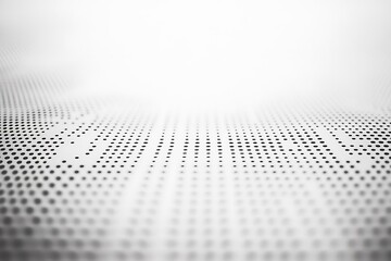 Abstract white background with black dots pattern for modern design and technology concepts