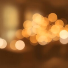 Blurred night lights, warm tones, city bokeh