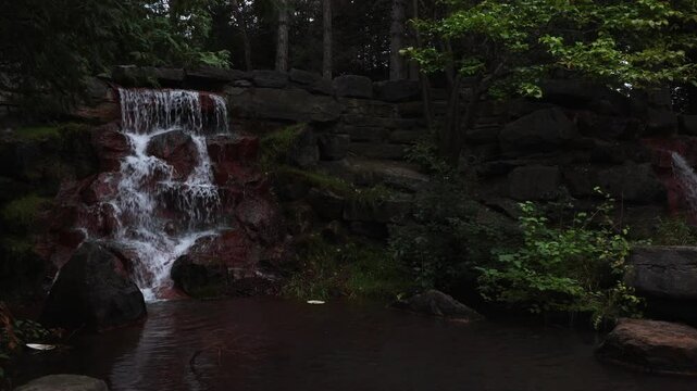 Waterfall in the park in summer. Keeley Falls in Andrew Haydon Park in Ottawa, Canada