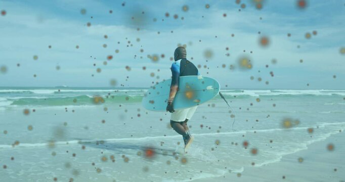 Surfer carrying board on beach with colorful abstract animation overlay