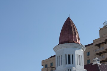 white dome building red roof