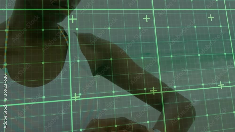 Poster interacting with digital grid interface, person focusing on animation and technology
