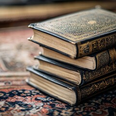 Obraz premium Selective focus of holy koran (Quran) stacked together.