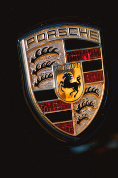 Close-Up Porsche Crest Sportscar, Porsche Logo Emblem, High-Performance Vehicle Car, Luxury Car Automobile Sign, Porsche 918 Spyder Hybrid Supercar Signage