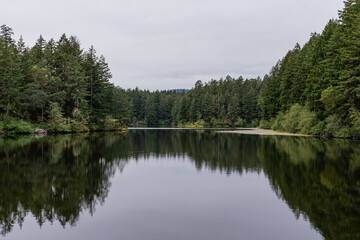 Upper Thetis lake at Thetis Lake Regional Park calm water and overcast day