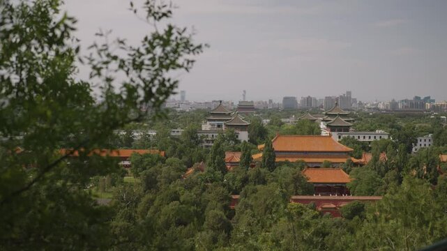 Beijing cityscape featuring the beihai park framed by lush trees