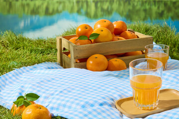 Wooden crates of oranges made from long wooden slats, with gaps between. Oranges with stems and...