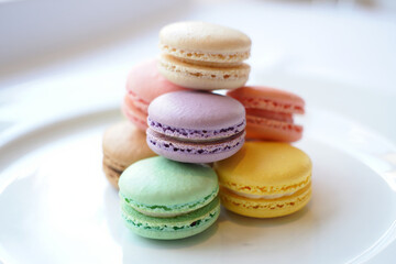 Obraz premium Luxury Sweets: Golden Macarons with a Clean Aesthetic