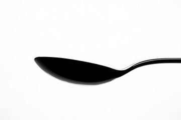 Spoon's Silhouette: Dark, Elegant Curve
