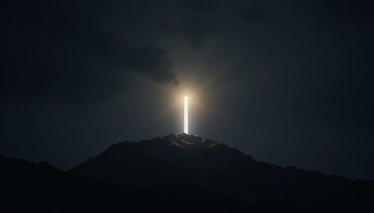 Illuminated Mountain Peak at Dusk