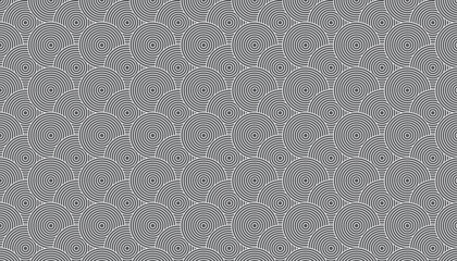 Gray seamless geometric pattern made of concentric circles creating a modern and stylish background. Concentric circles forming seamless geometric pattern background
