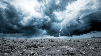 Ominous storm clouds gathering over barren landscape nature scene dramatic environment distant viewpoint