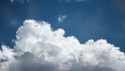 Cumulus clouds against blue sky