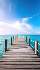 Obraz premium Gray weathered wooden pier deck extends over calm blue sea under summer sky, travel, nature