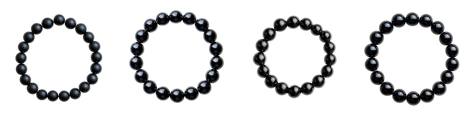 Obraz premium Four sleek and sophisticated black pearl bracelets showcasing a simple elegant minimalist design